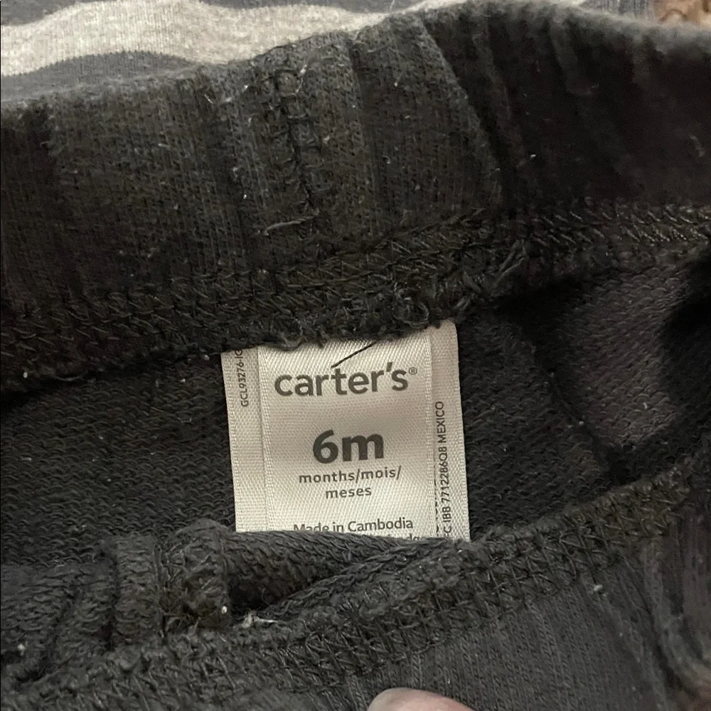 Gerber Carters outfits him